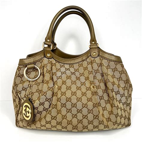 gucci heavy large handbags with gold plated incrustations|authentic Gucci shoulder bag.